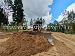 Отсыпка участка песком в Порошкино